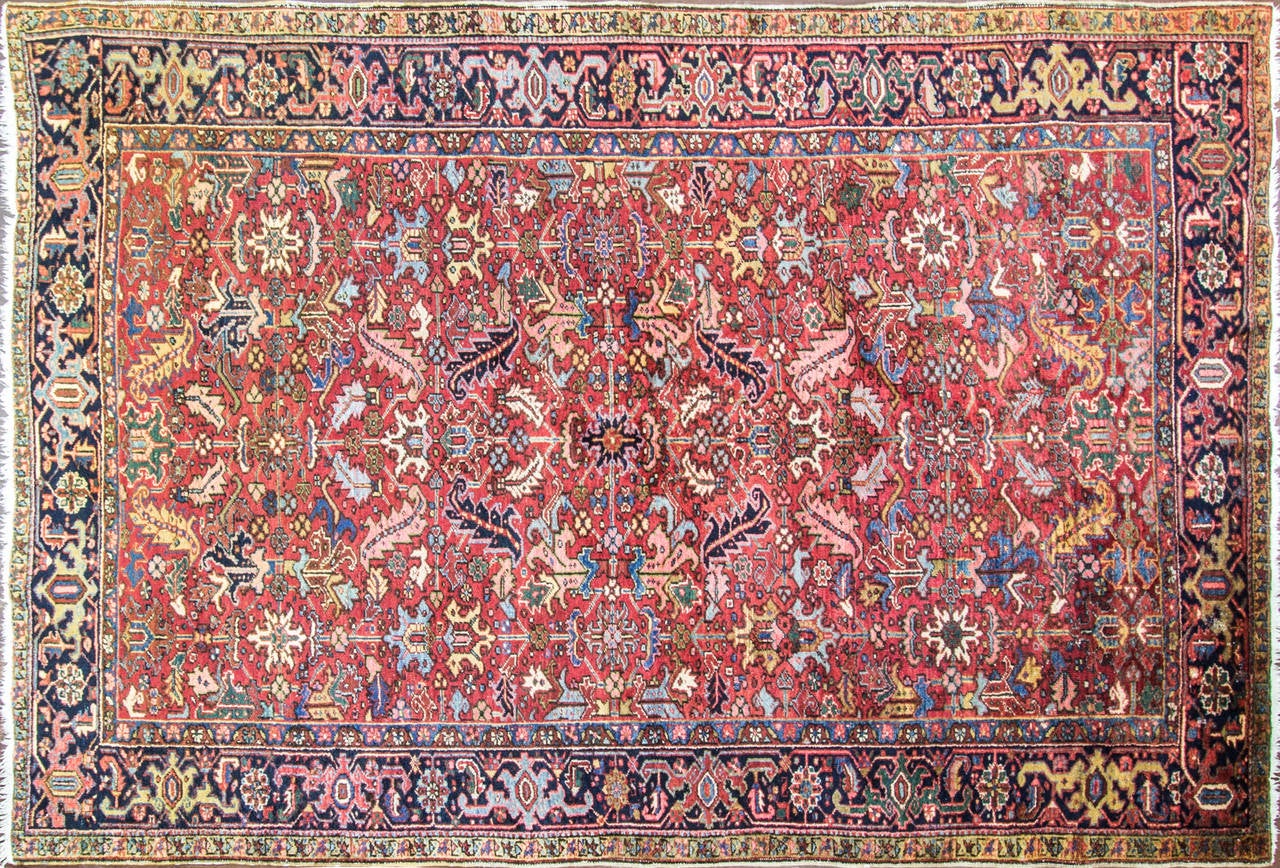 Natural wool dues, the multi colors are amazingly beautiful, mostly like antique Serapi. Charming all over design with geometric motives. Heriz rugs are Persian rugs from the area of Heris, East Azerbaijan in northwest Iran, northeast of Tabriz.