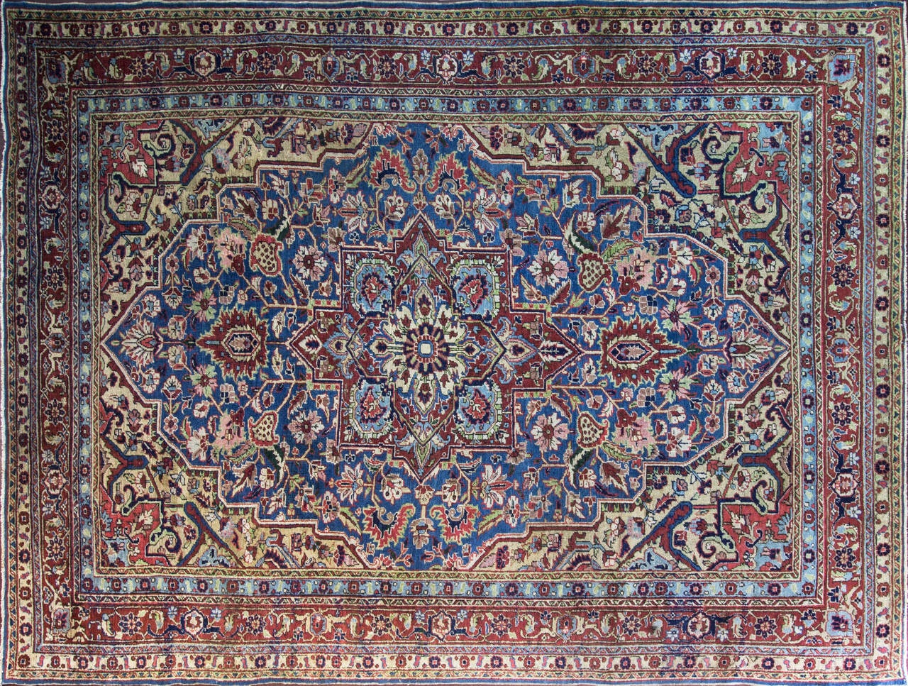 Natural wool dues, the multi colors are amazingly beautiful, mostly like antique Serapi. Charming all-over design with central medallion. Heriz rugs are Persian rugs from the area of Heris, East Azerbaijan in northwest Iran, northeast of Tabriz.