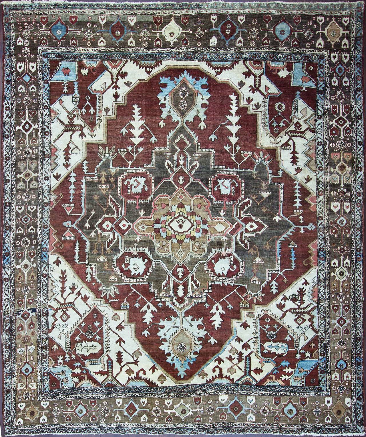 Serapi rug could be also Bakshaish because of his motifs like birds in the center medallion and combination of colors, Primitive design and weave. The beautiful design of birds and their egg inside of the nest. Decorated with traditional patterns