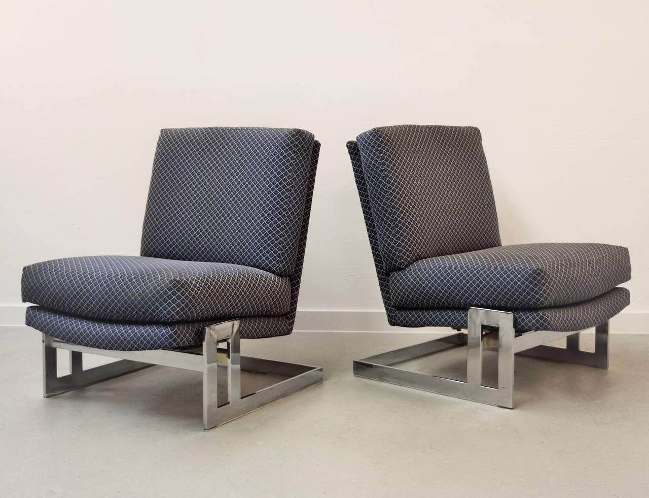 Pair of chrome framed Milo Baughman lounge chairs.