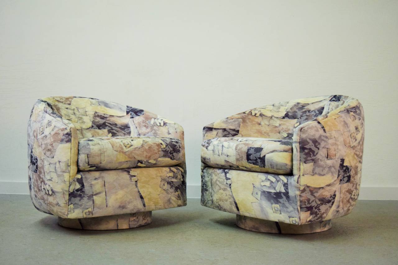 Pair of rock and swivel Milo Baughman chairs.  Matching pair available in separate listing.