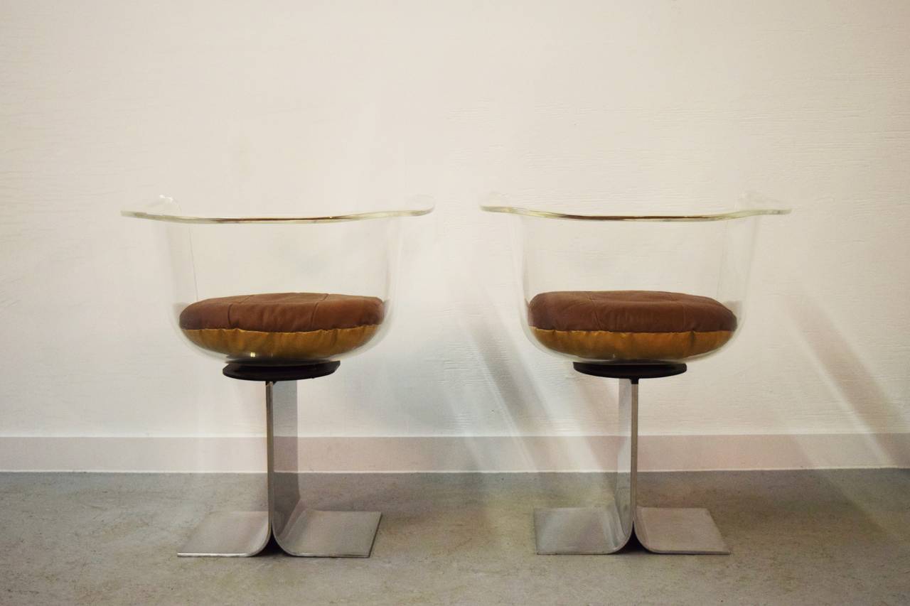 Pair of Lucite Swivel Chairs with Steel Bases 1