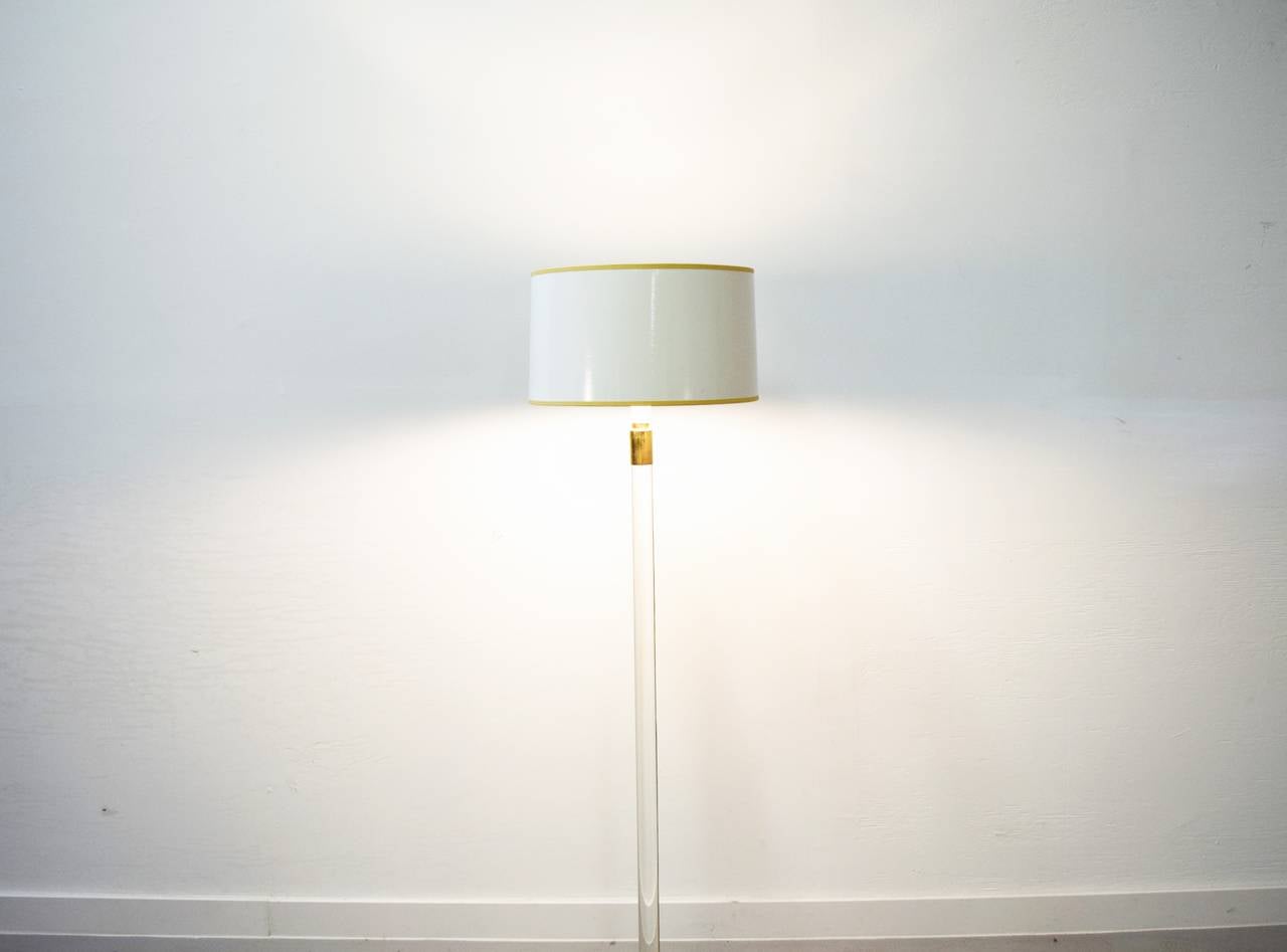 Lucite and brass floor lamp by Hansen.