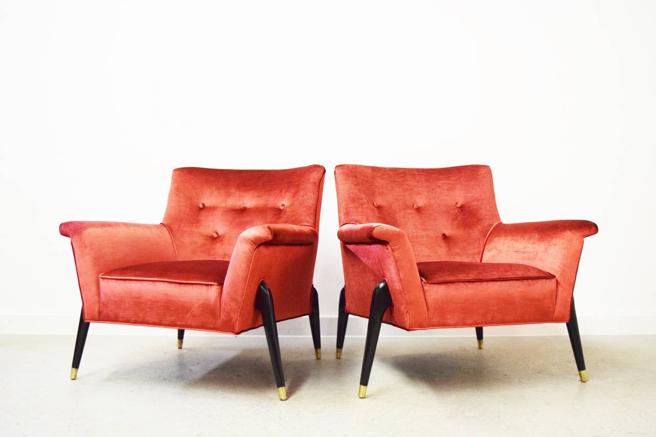 Mid-Century sculpted spider leg lounge chairs. Chairs have been newly re-upholstered in velvet.