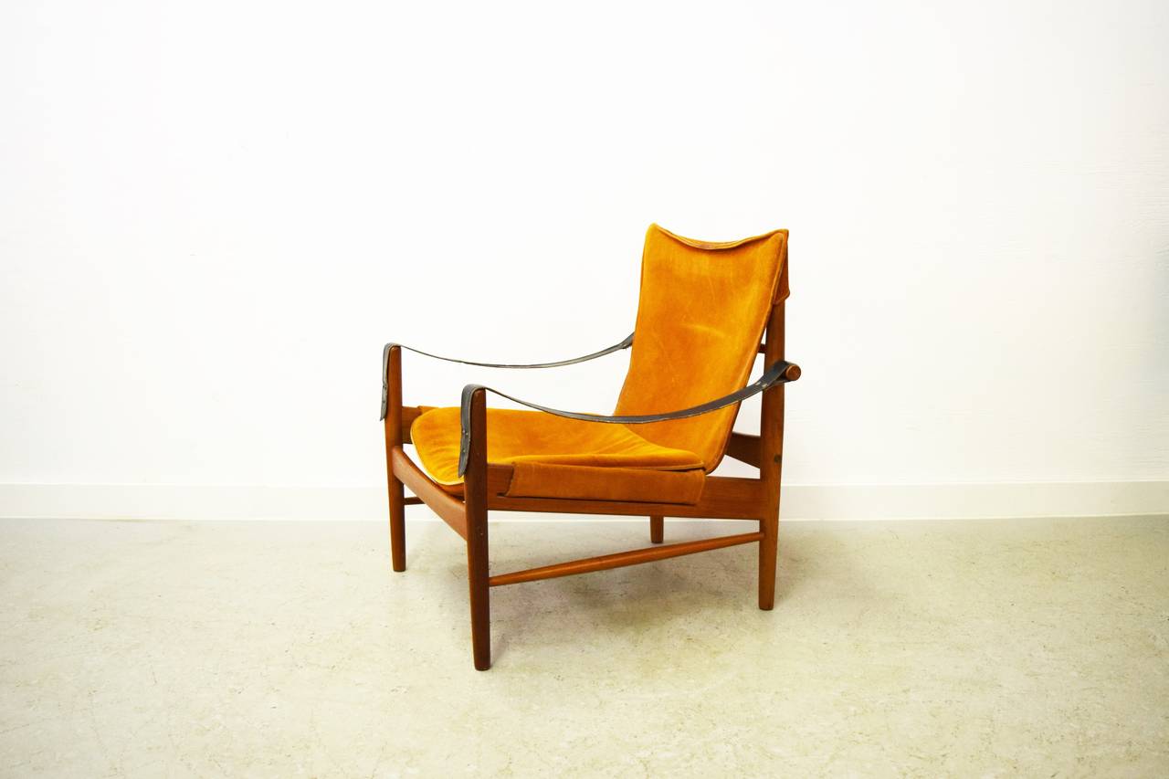 Hans Olsen Safari Chair.  Suede with leather arm straps.  Seating area depth is 20