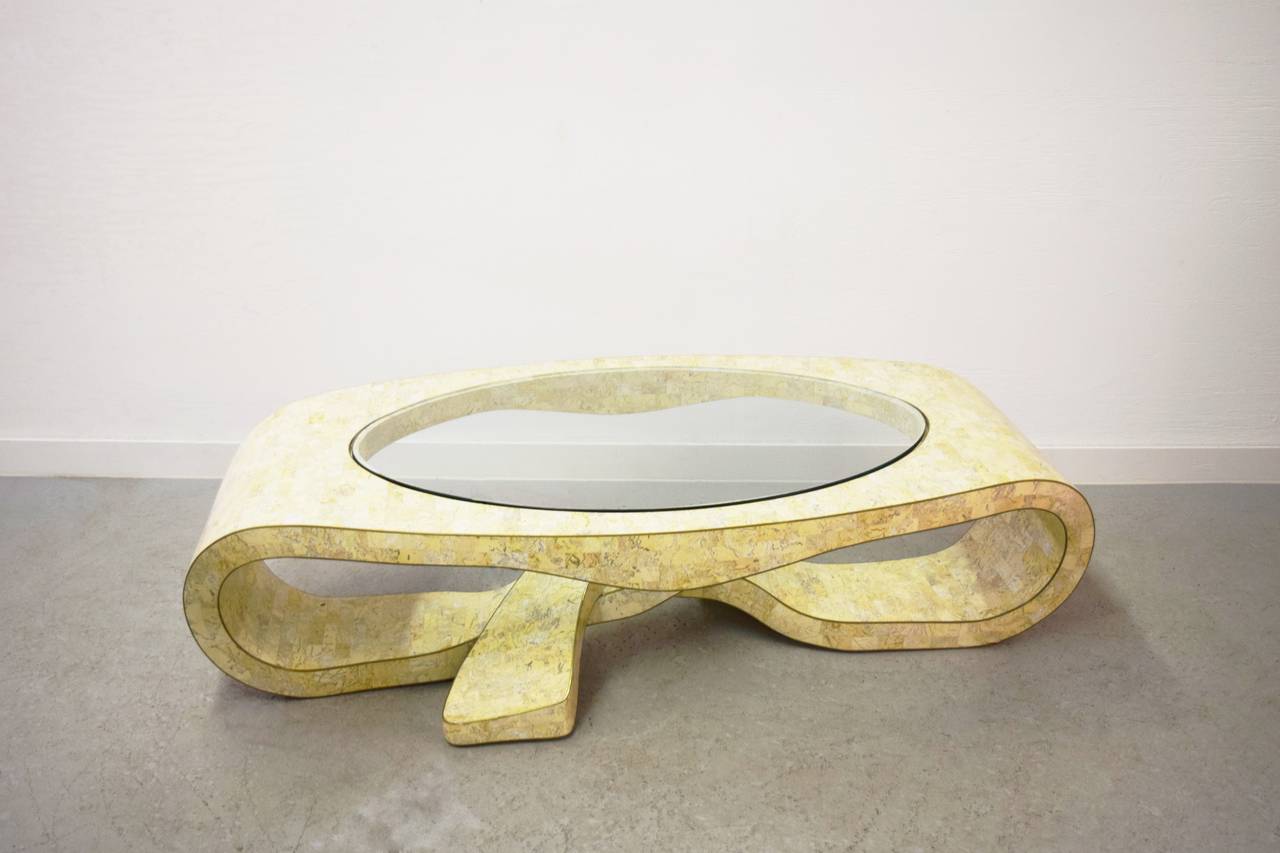Maitland-Smith tesselated stone sculptural coffee table.