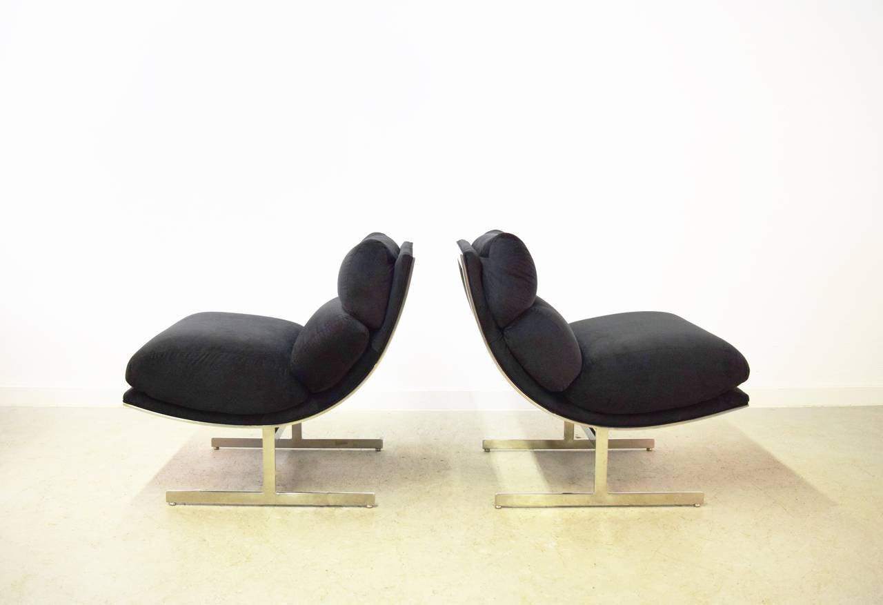 Pair of Kipp Stewart Lounge Chairs.

Chromed steel bases with new black velvet upholstery.