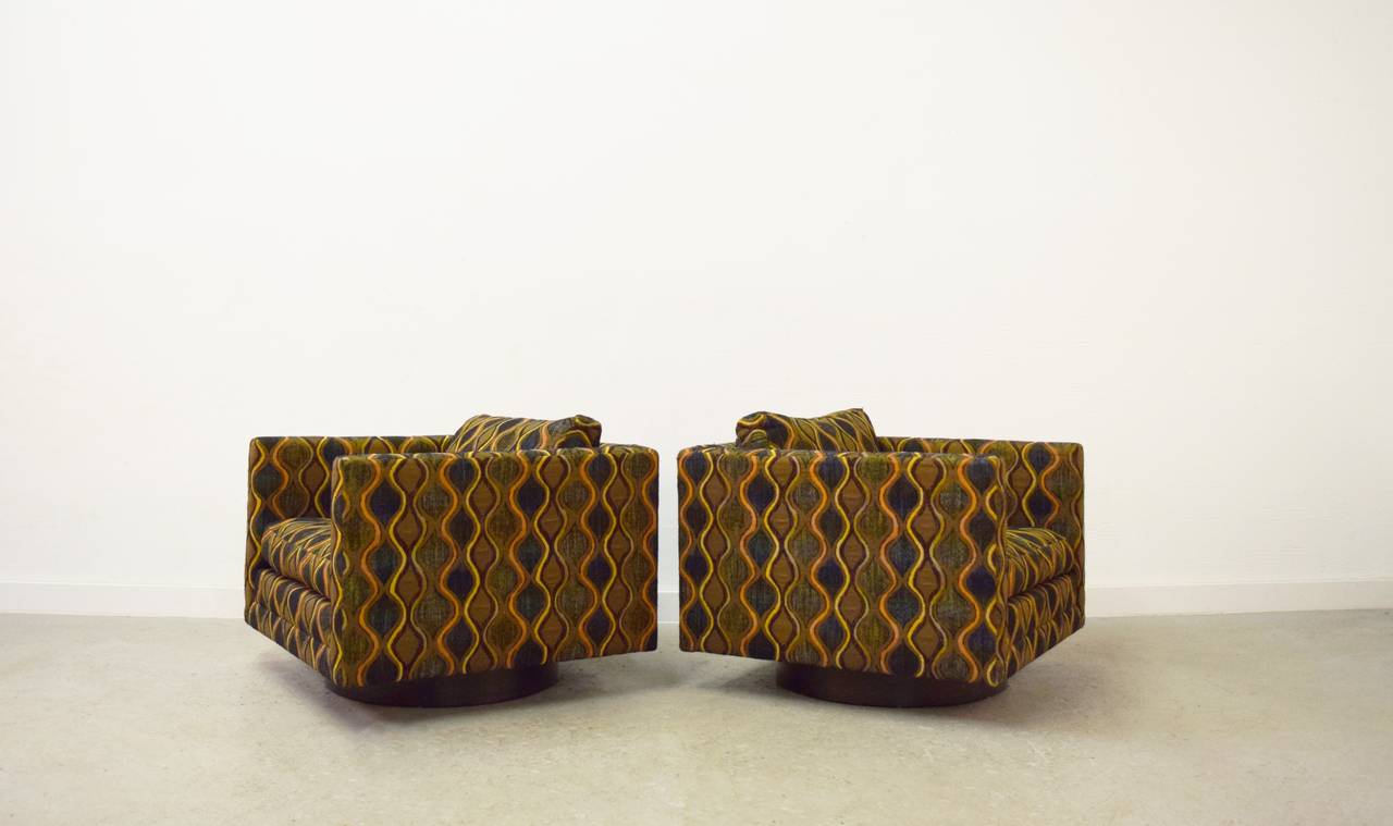 Pair of Harvey Probber swivel lounge chairs.