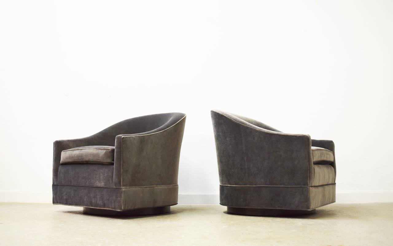 Pair of Harvey Probber swivel lounge chairs.