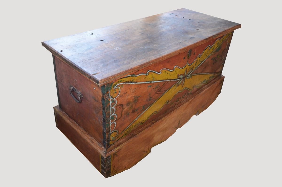 Antique chest originally used to store valuables. Top made from a single slab of teak. Original hardware.