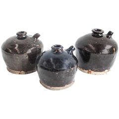 Black glazed Chinese kitchen pots with spouts