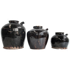 Black glazed Chinese kitchen pots with spouts