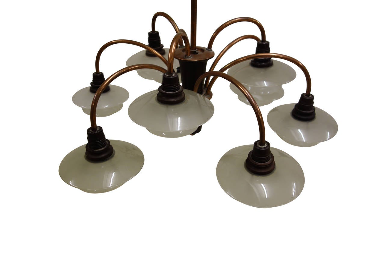 Poul Henningsen 9 arm bombardment chandeliers, fixture of brass with bakelite fittings, glass size 1/1, stamped 