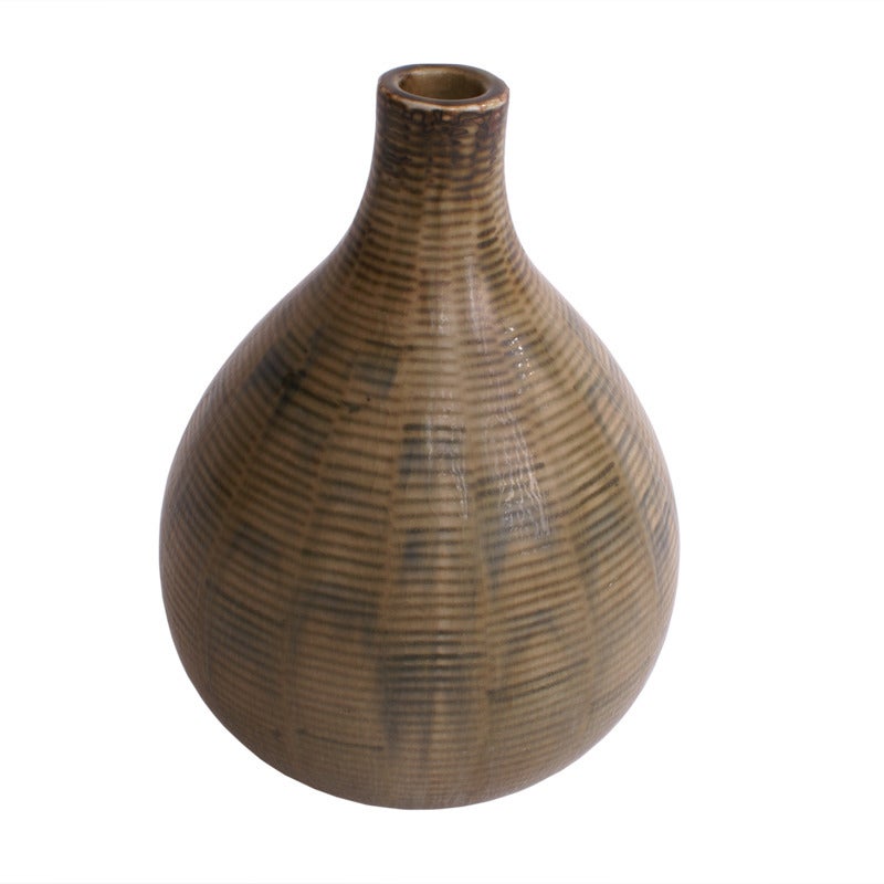 Axel Salto stoneware vase with vertical pattern in green elements. Decorated with sung glaze. Signed 