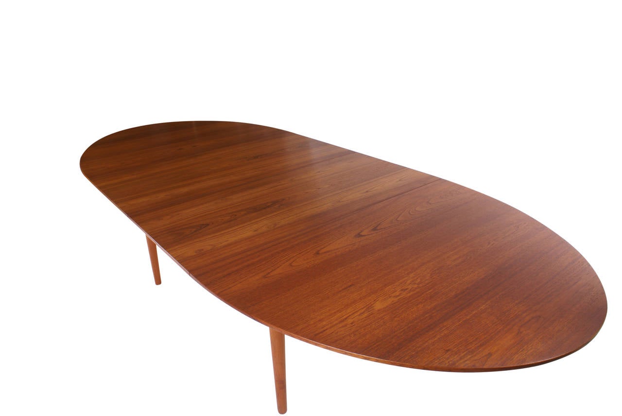 Finn Juhl 'Judas' dining table. Oval teak dining table. Two extention leaves. Made and stamped by cabinetmaker Niels Vodder, Copenhagen.

Branded to underside: 