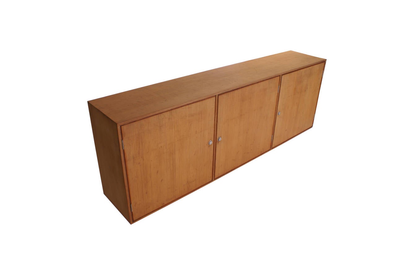 Rare Poul Kjaerholm wall-hanging cabinet in Oregon pine for E. Kold Christensen.

Only two examples of this wall cabinet is known to exist.

Provenance: comes from an architect practice in Copenhagen where Poul Kjaerholm was commissioned to do