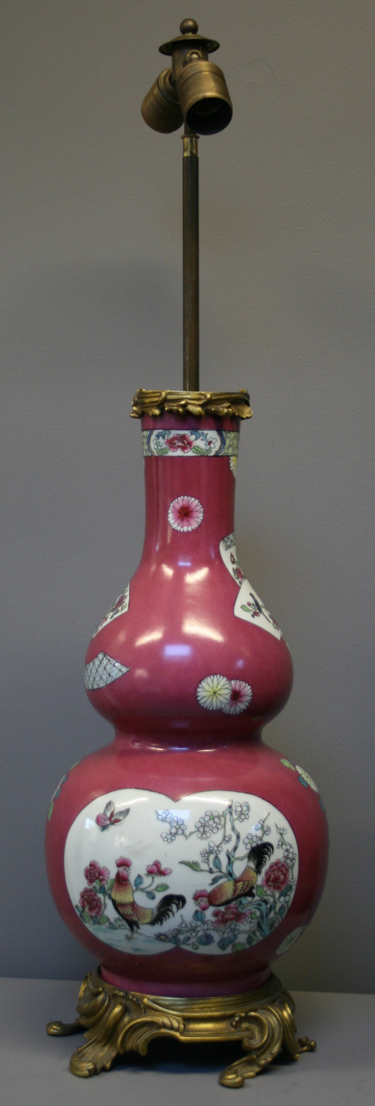 French A Chinese style famille rose Samson gourd vase with ormolu lamp fittings