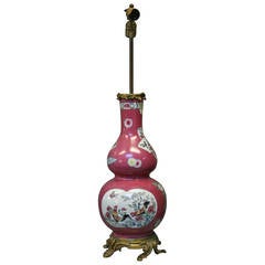 A Chinese style famille rose Samson gourd vase with ormolu lamp fittings