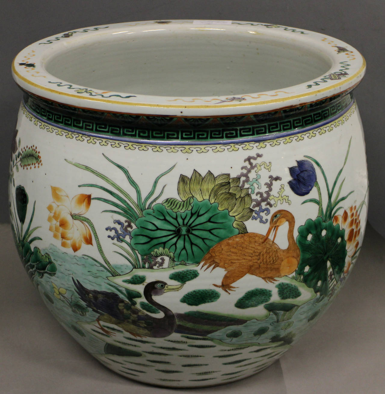 A Chinese famille verte jardinière decorated with a continuous scene of ducks in a lily pond.

(Buyers in the UK and Europe will be subject to +VAT)
