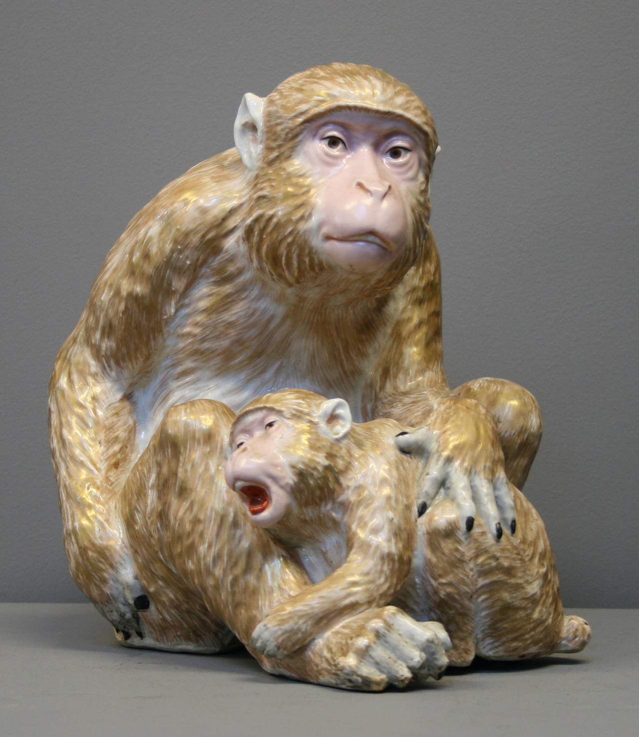 A large Japanese Kutani-ware figure of a golden monkey and infant

(Buyers in the UK or Europe will be subject to +VAT)