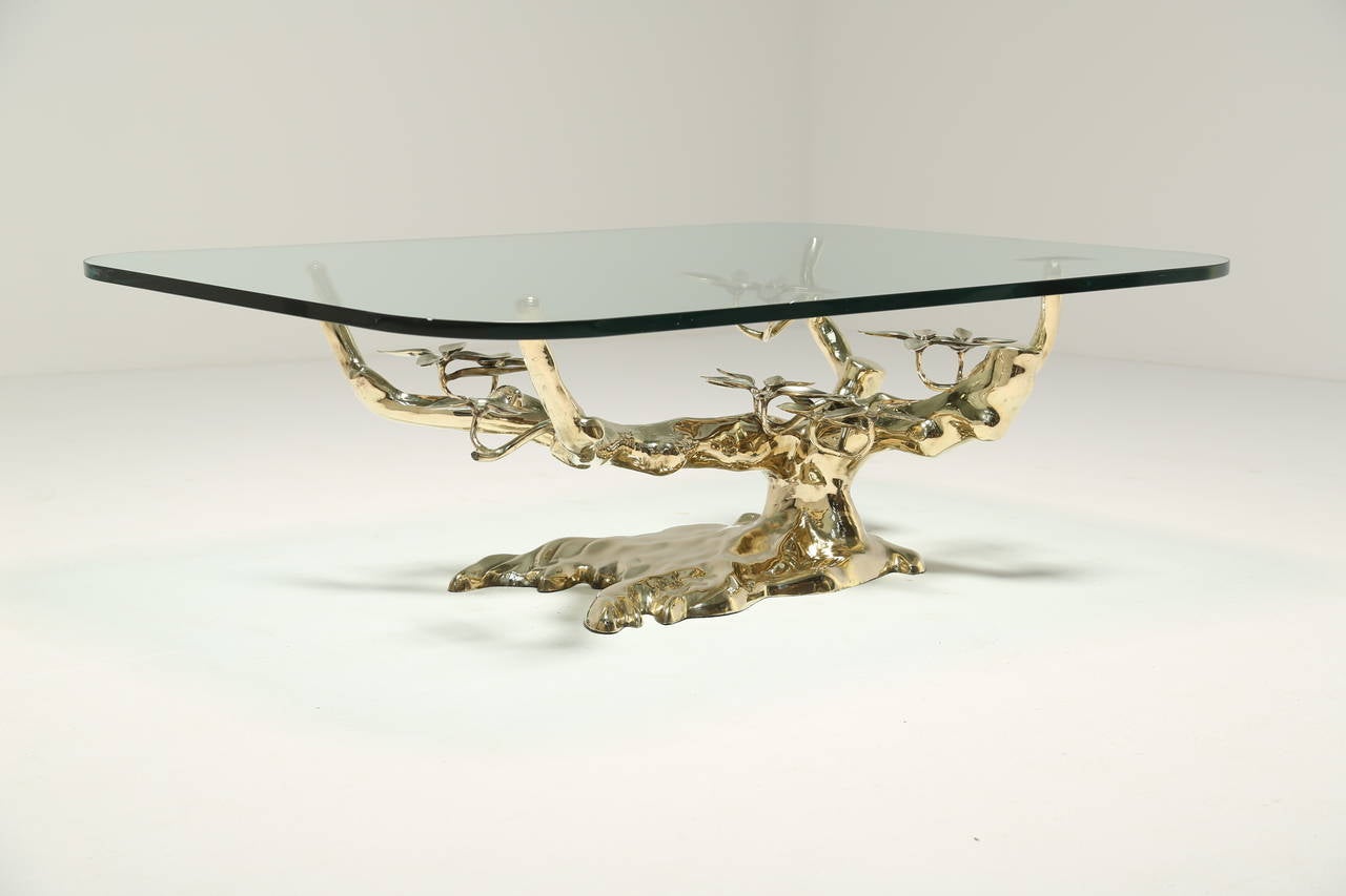 A brass coffee table in the style of a bonsai tree in the style of designer Willy Daro. If you are after a statement coffee table then look no further, photos can just about do a piece like this justice. Its a beautiful table in person and super
