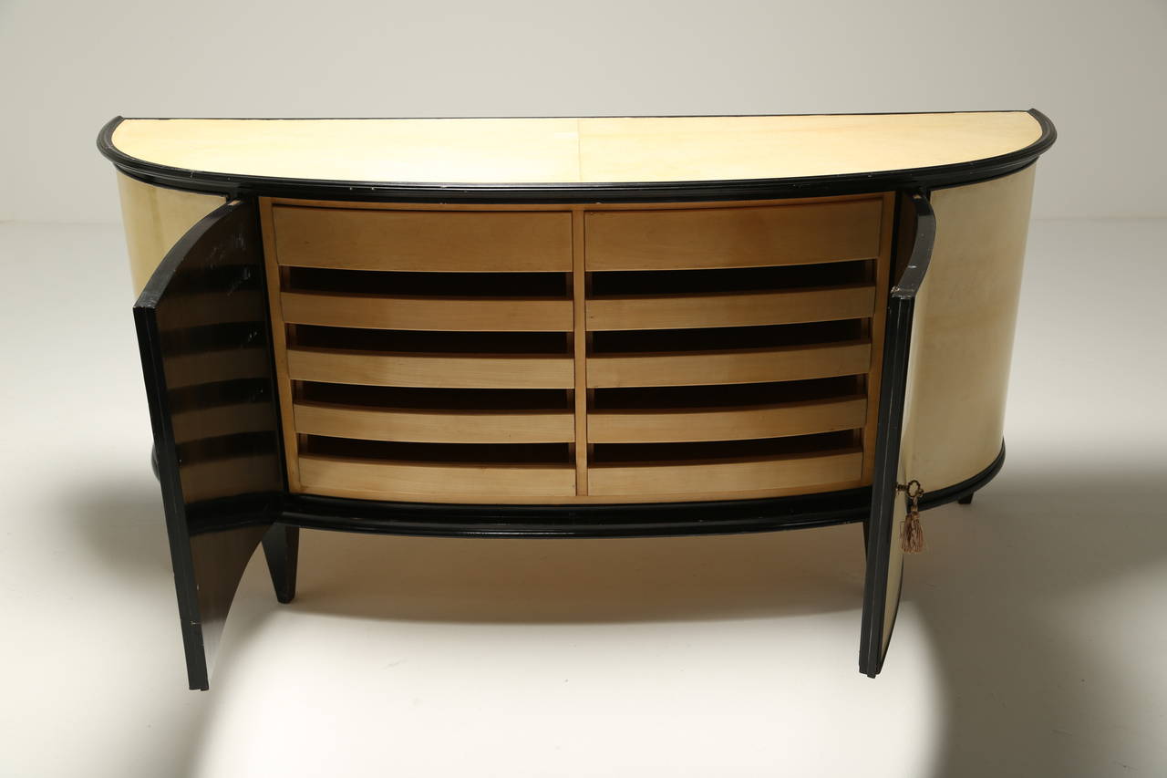 Mid-20th Century An Italian Parchment Covered and Ebonised Demi-Lune Sideboard