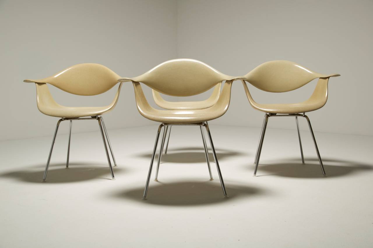 Four George Nelson DAF Herman Miller chairs on an original H base,this configuration was not offered in the HM catalogue and therefore must be a custom design via the HM factory. The chairs are completely original with stamped Herman Miller shock