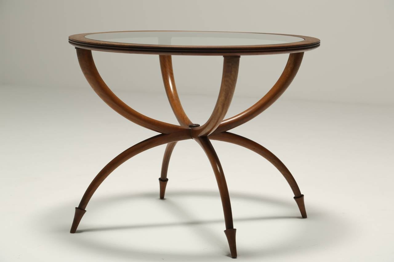 A Fruitwood Spider Table with circular glass top and beautiful detailed feet, possibly the nicest spider table ever made.
