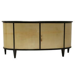 An Italian Parchment Covered and Ebonised Demi-Lune Sideboard
