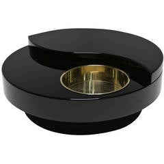Mario Sabot swivel black lacquer and brass coffee table.