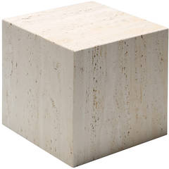 A Travertine Cube Side Table.