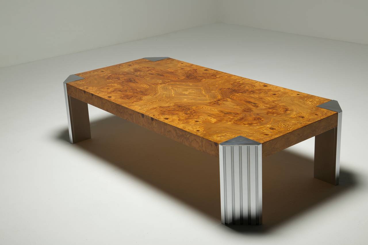 A Burlwood  and chrome coffee table with chrome skyscraper legs. Large size table in very good vintage condition. Often attributed to Leon Rosen and Pace collection.