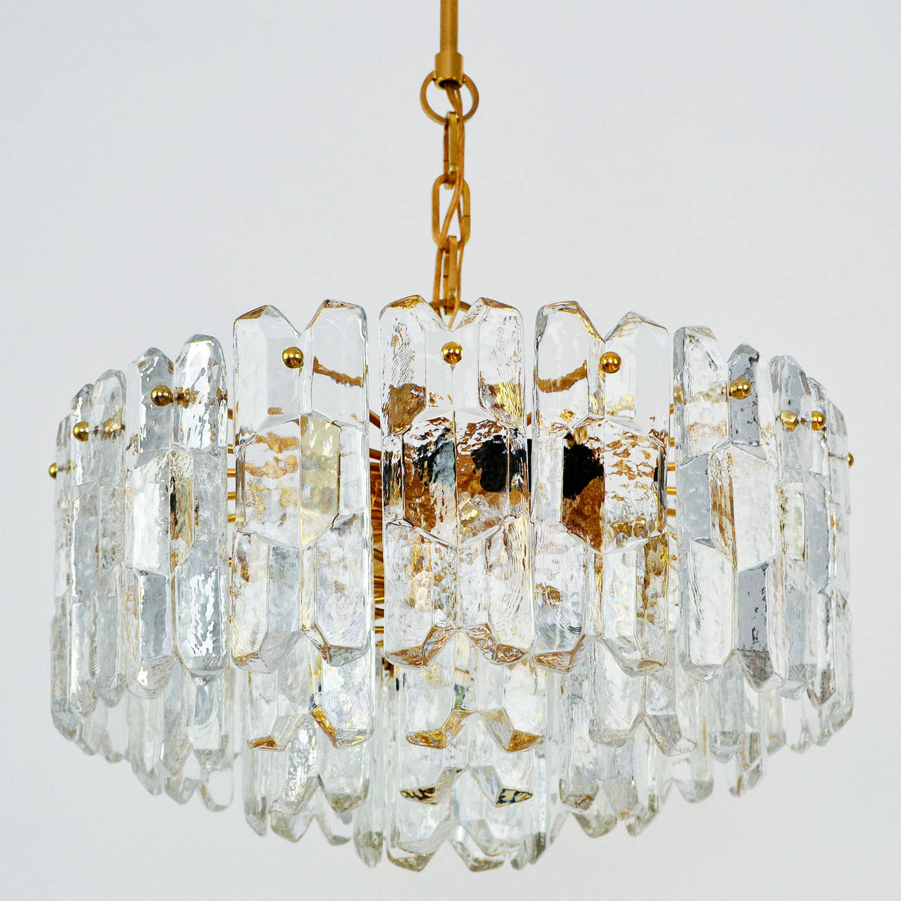 A very exquisit 24-carat gold-plated brass and clear brillant glass 'Palazzo' flush mount lights by J.T. Kalmar, Vienna, Austria, manufactured in circa 1970 (late 1960s and early 1970s). Labeled.
This light is a handmade and high quality piece.