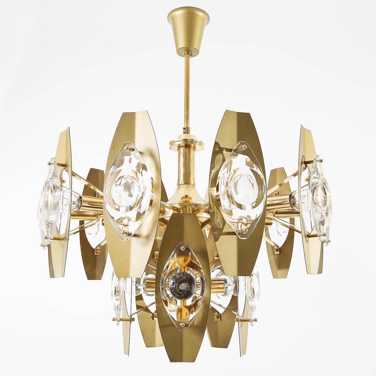Two stunning and beautiful chandeliers by Gaetano Sciolari, Italy, manufactured in Mid-Century, circa 1970 (end of 1960s and beginning of 1970s). Each chandelier has 15 arms which hold large glass lenses and sockets for small base bulbs E14 with 40W