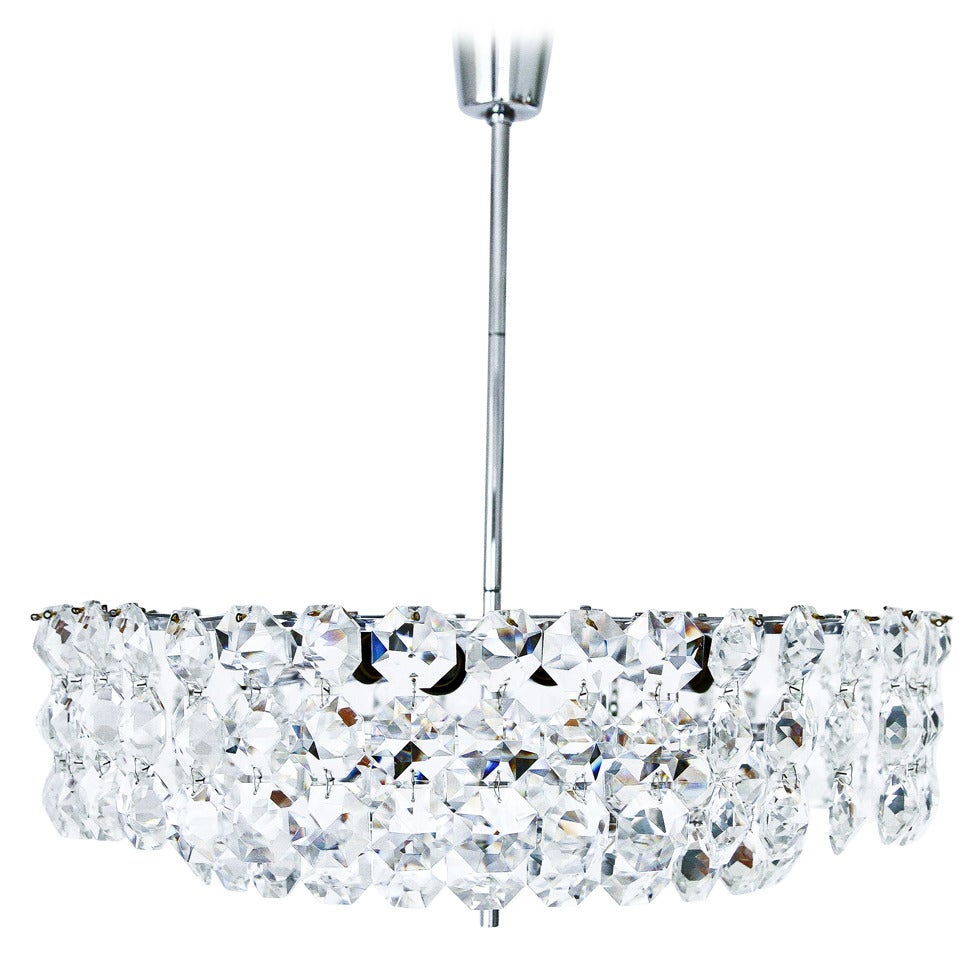 A Viennese chandelier by Bakalowits & Soehne, manufactured in Mid-Century, circa 1960. It is made of hand cut diamond shaped crystal glass and a nickeled brass frame. This chandelier is absolutely timeless because of the simple and modern