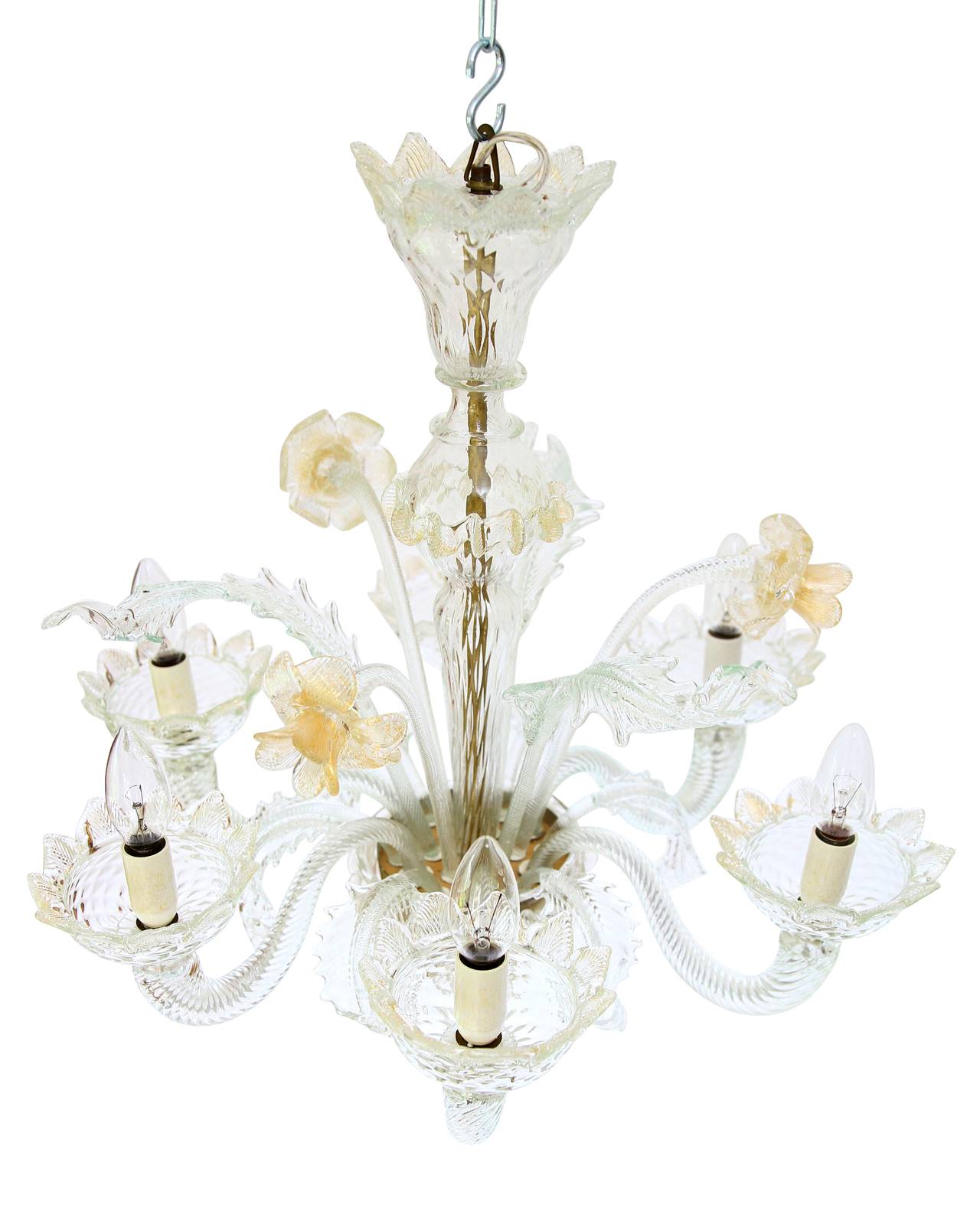 A beautiful floral chandelier made of clear hand blown Murano glass with gold inclusions, Italy. An outstanding Italian lamp from the 1940s.

The light has six arms with sockets for small base bulbs or LEDs.
Professionally cleaned, excellent