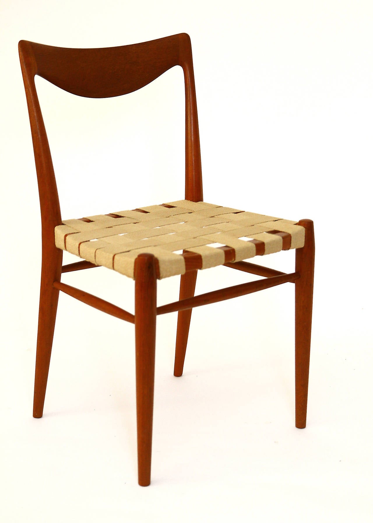 A beautiful set of 6 Danish teak dining or side chairs in the style of Niels Otto Moeller, Denmark, 1960's. Simple and timeless Mid-Century Modern / Danish Modern design. The seats are covered with textile straps which looks great and makes them