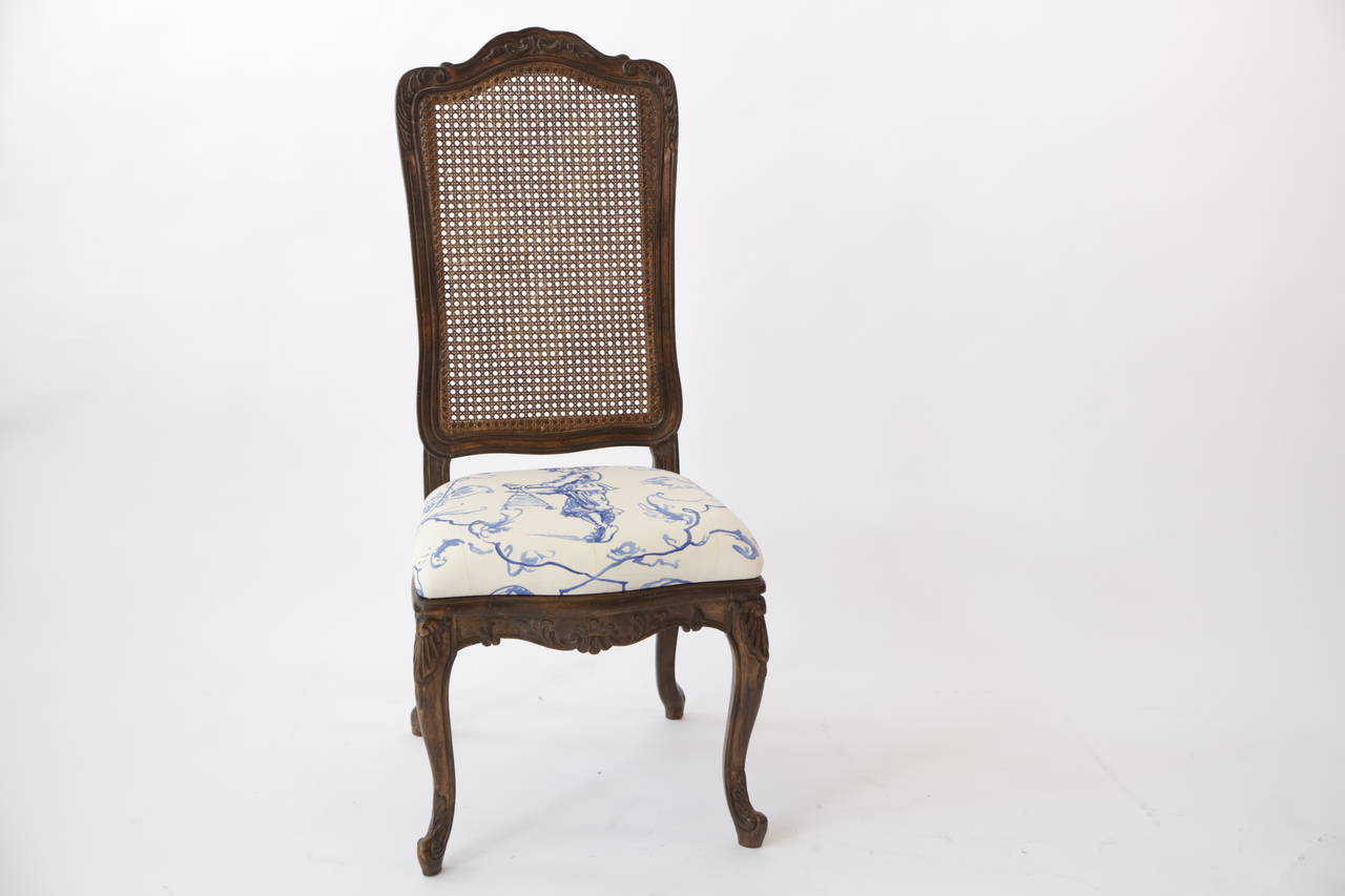 Set of 8 dining chairs

Textile: Sintra in Adriatique  by Pierre Frey

This set of eight high-backed side chairs recalls furniture popular in England in the mid-1700’s. Just after the delicate plain Jane Queen Anne period and just before fashion