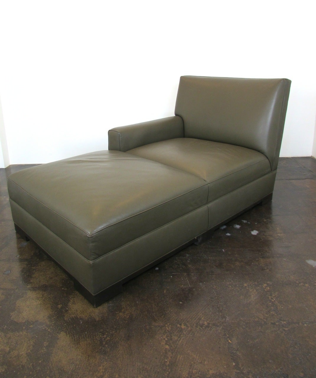 Dark olive green leather Hugo chaise lounge by Terry Hunziker for Sutherland.