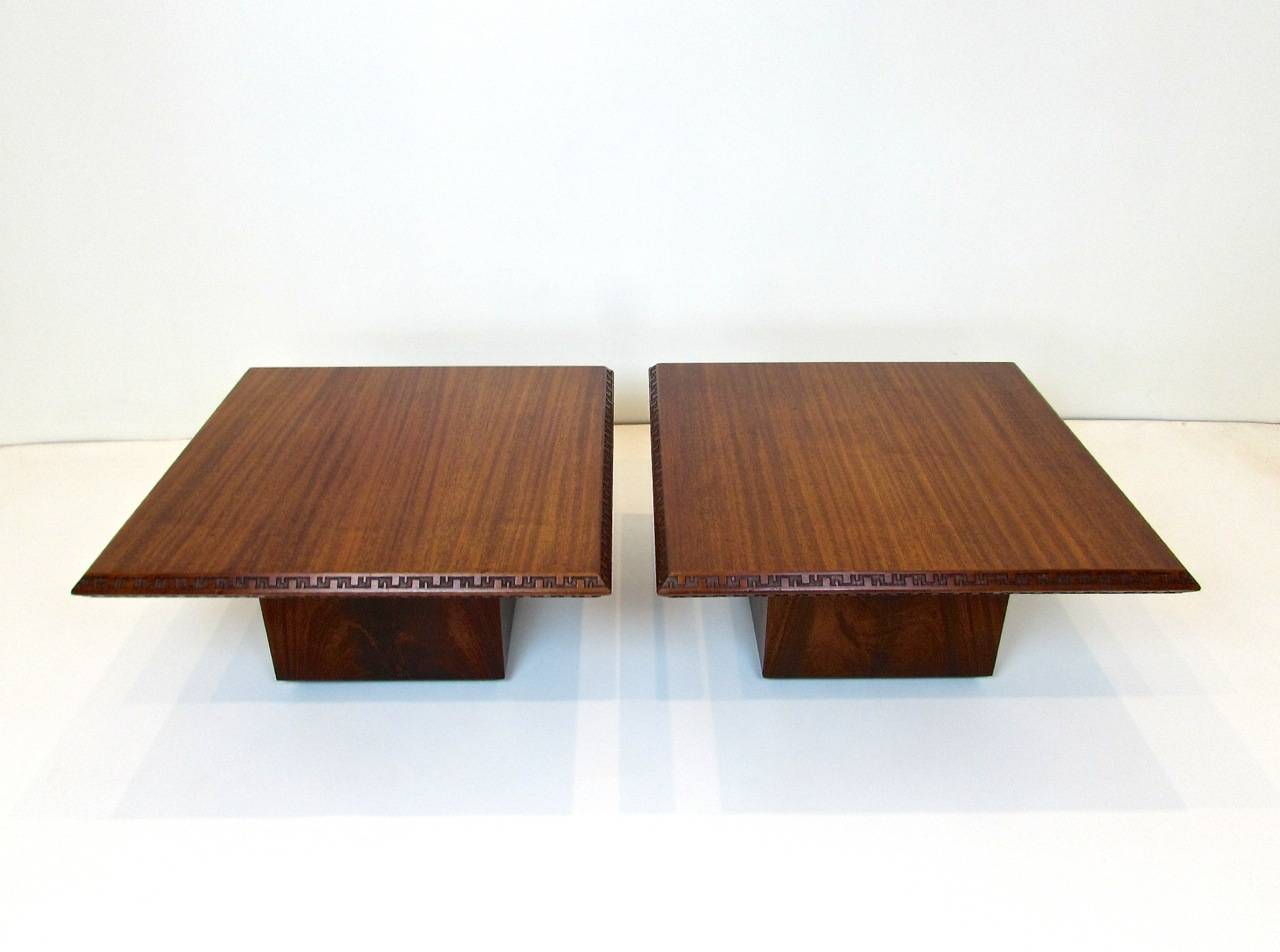 Pair of Frank Lloyd Wright for Heritage Henredon mahogany side tables with Taliesen design edge.