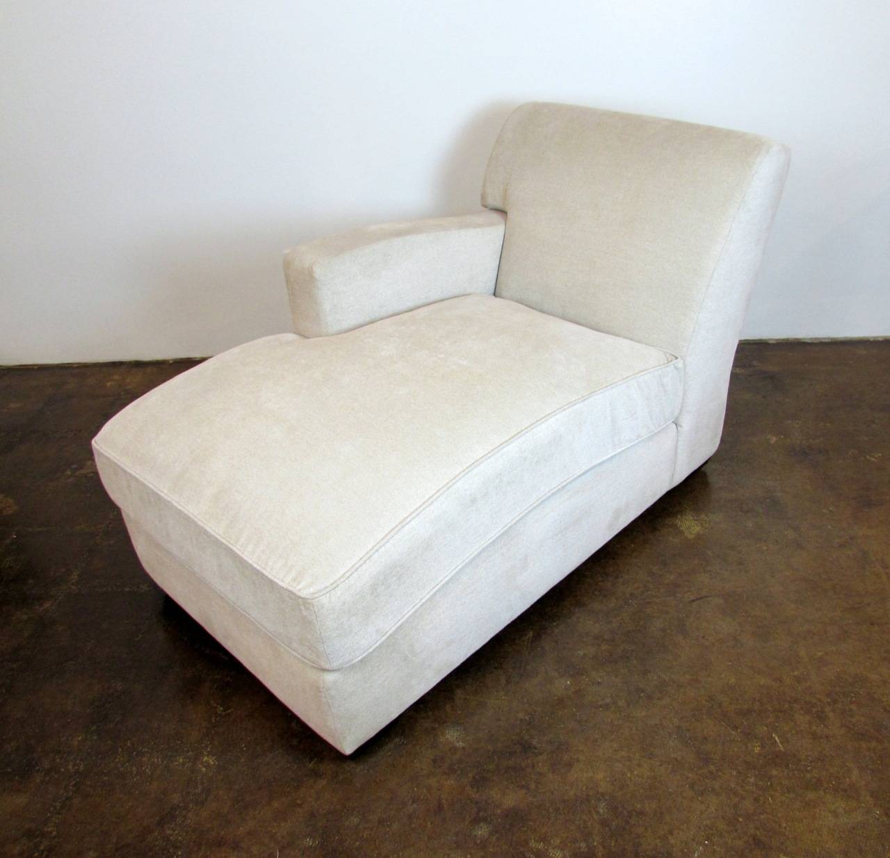Christian Liaigre for Holly Hunt Brousse left arm facing, off white chenille chaise lounge with a tight back, loose seat cushion, and ash feet in Ebonized finish.