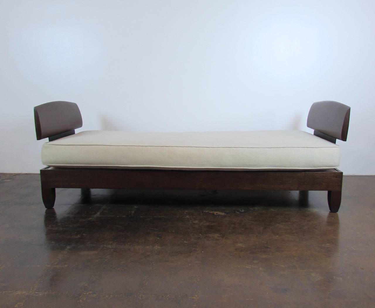 Classic Daybed by Chris Lehrecke in walnut with a boiled wool cushion.