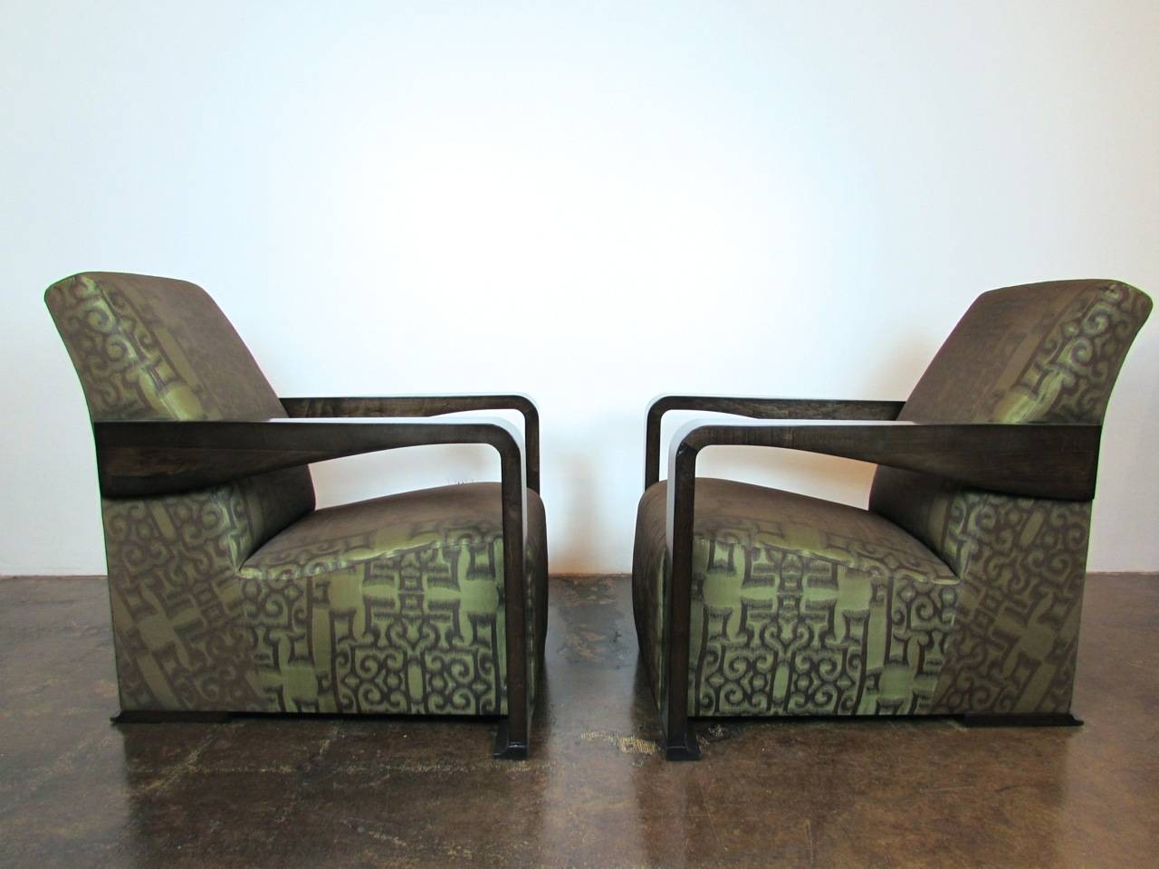 Pair of Sycamore Ying chairs by Hugues Chevalier in iridescent upholstery.