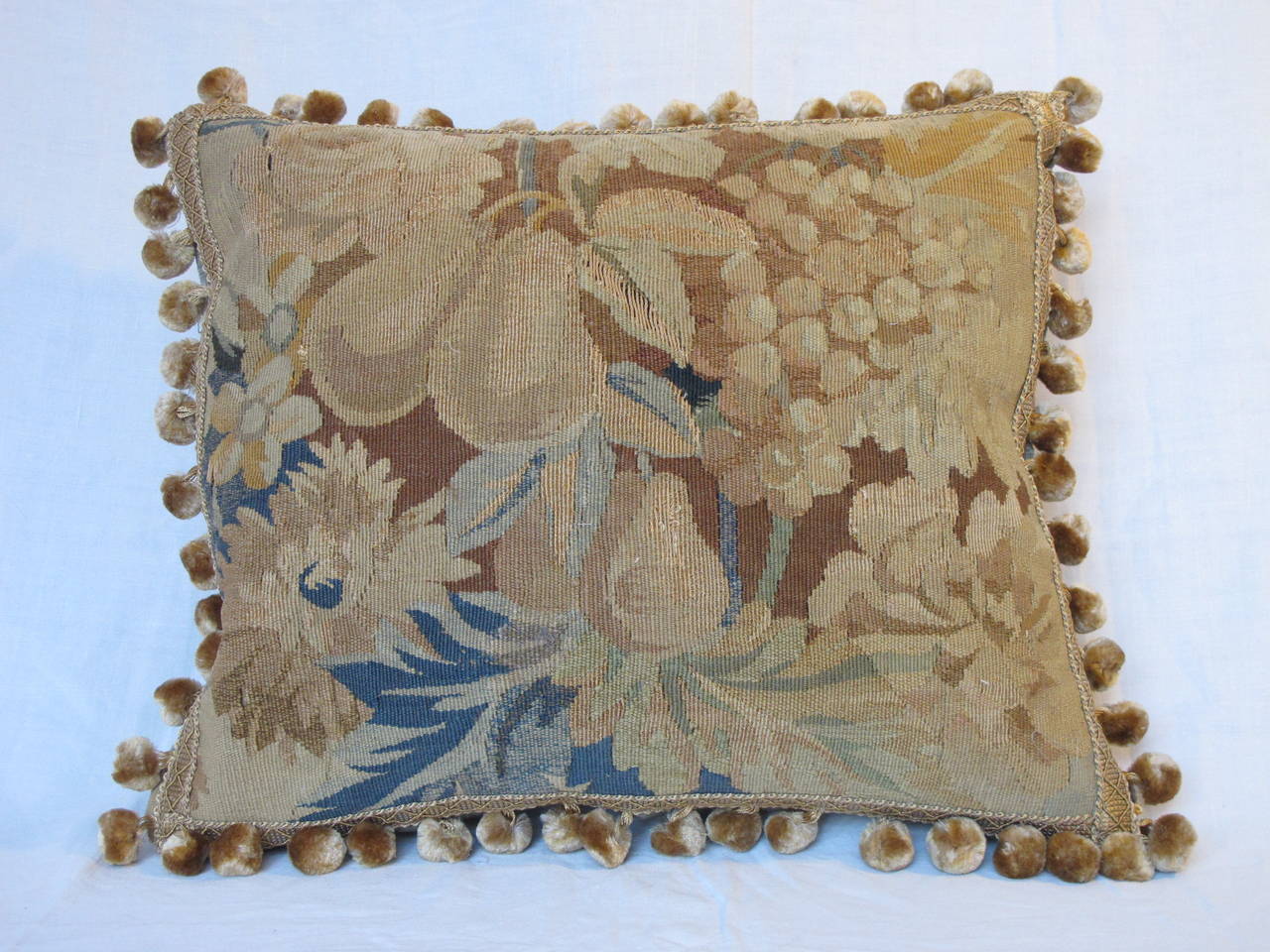 Newly made pillow from an early Aubusson tapestry, embellished with silk tassel fringe, and backed with a coordinating silk velvet.