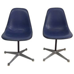 Herman Miller swivel chairs, pair.