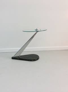 Atomic style side table. Aluminum with granite base and glass top.