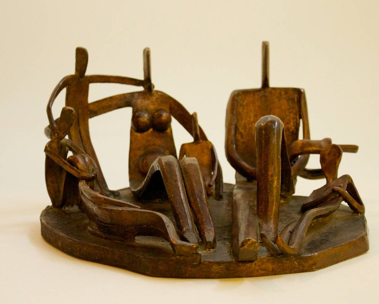 Stunning bronze abstract sculpture depicting a family relaxing together by artist Dudley Pratt. Pratt was an American sculptor who studied under Alexander Archipenko (who studied alongside Pablo Picasso). Pratts major work includes sculpture for the