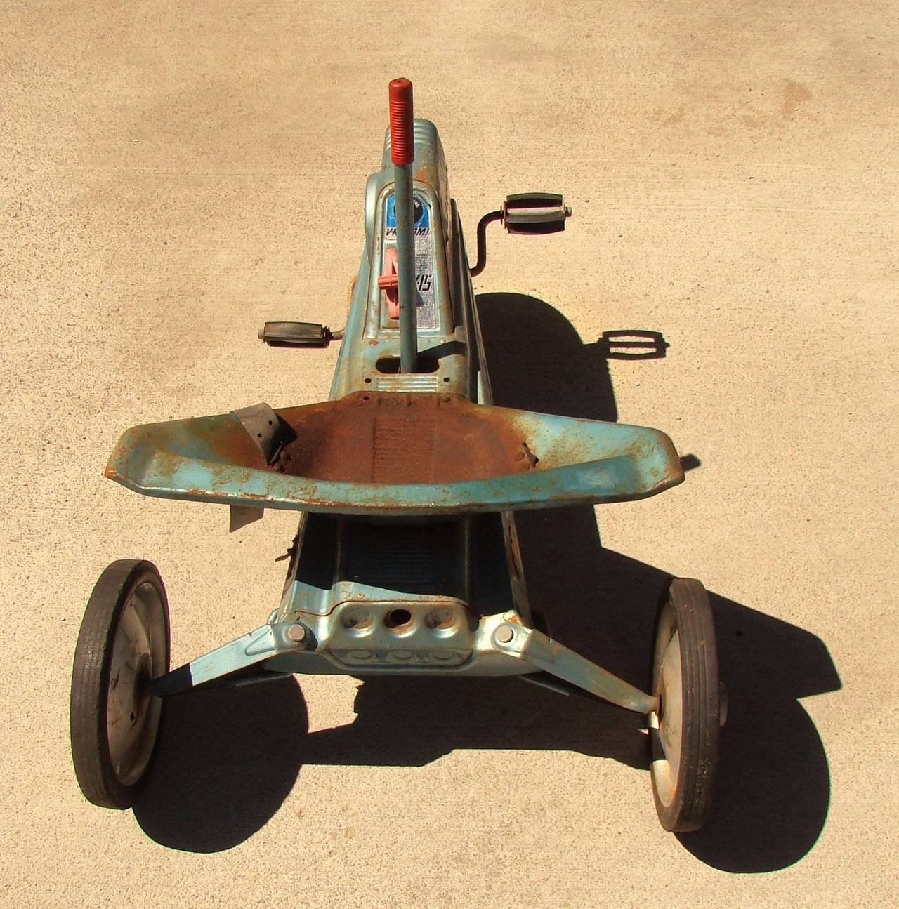 Awesome all original Mattel Vrroom pedal dated 1963. There is some wear and tear on the this little car but it has definite character. Still very much operable or a great piece for display. Retains the original Mattel sticker on the front and 2