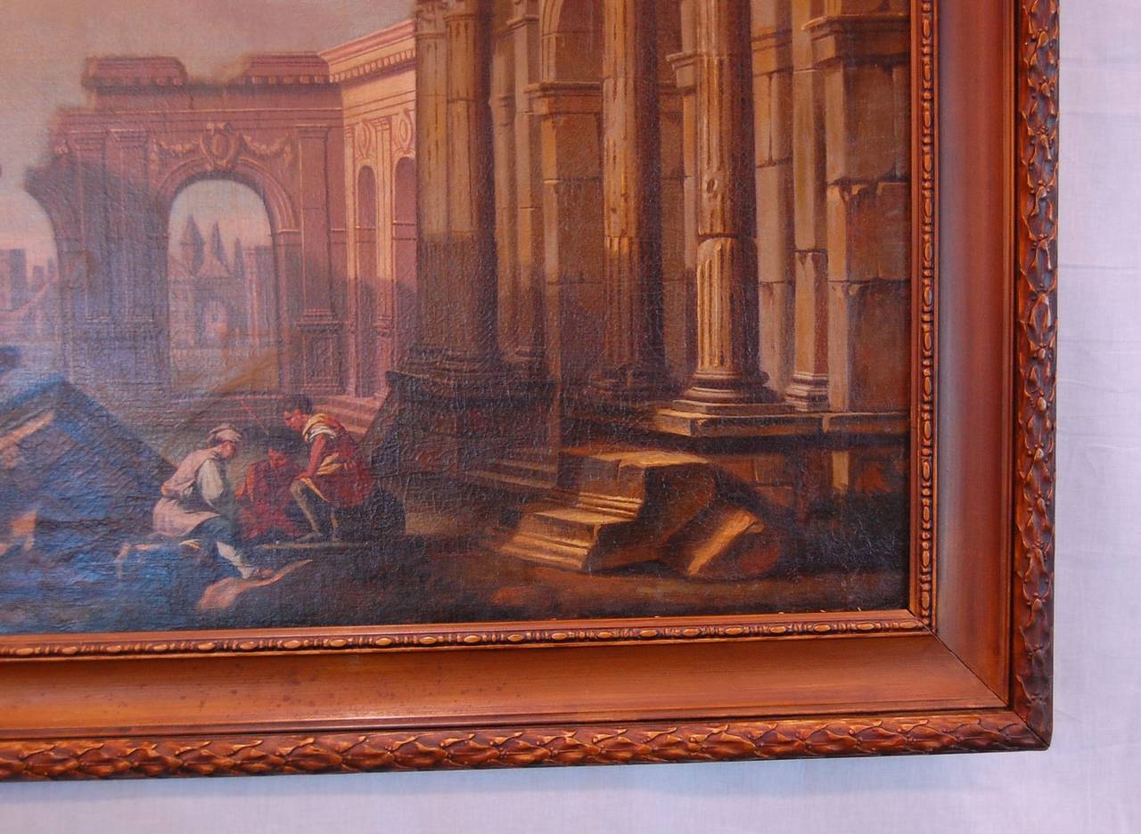 This is one of two identically framed 19th century oil paintings of architectural ruins, stretcher size: 25