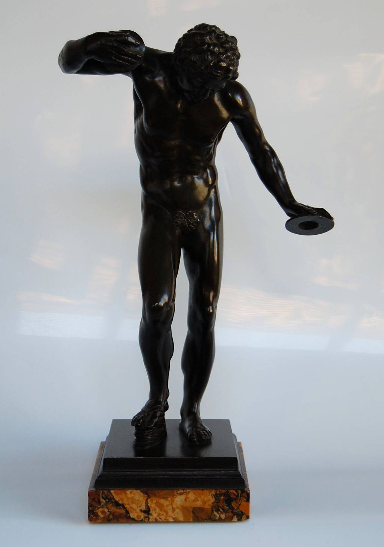 Highly detailed Satyr on rare marble base, after Myron. In excellent original condition. Origin unknown but believed to be French.